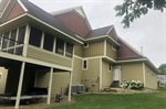 How can painting transform a home’s curb appeal in Minnesota’s climate?