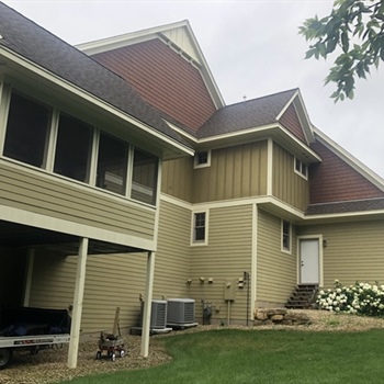 How can painting transform a home’s curb appeal in Minnesota’s climate?
