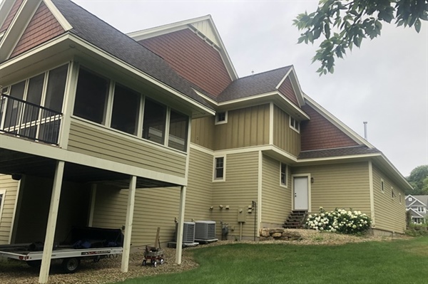 How can painting transform a home’s curb appeal in Minnesota’s climate?